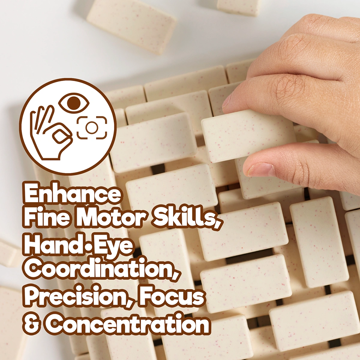 Child building Arch-Kid-Tech® Egyptian Pyramid toy to develop fine motor skills focus and hand-eye coordination